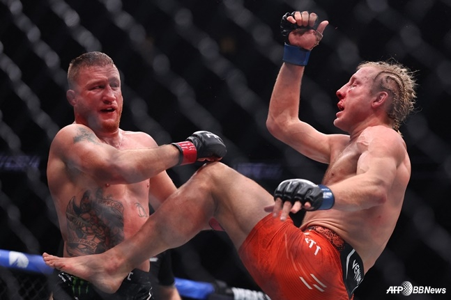 =图为，盖奇（左）正在和Pimblet比赛。