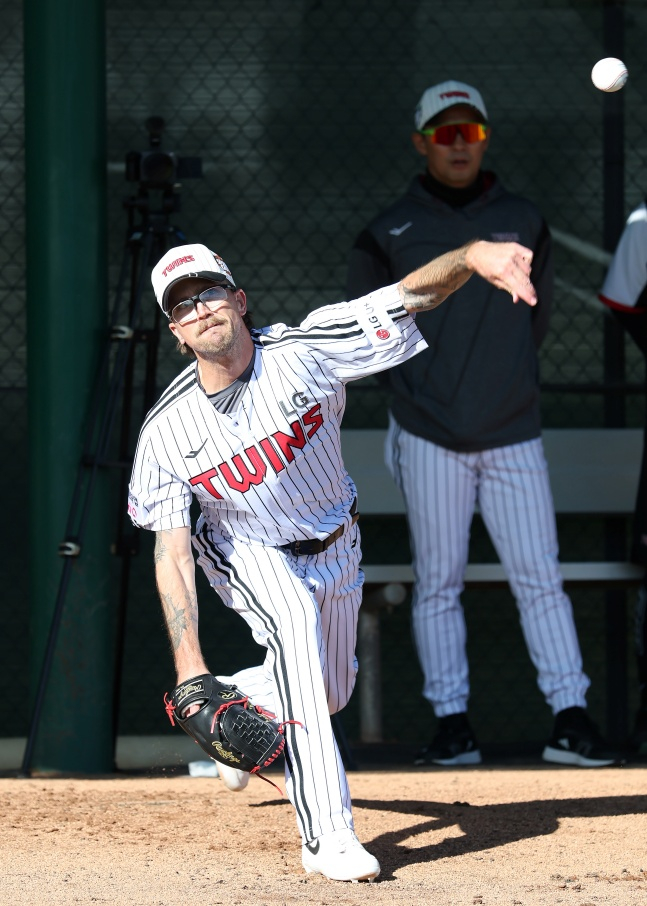 Lachlan Wells recently throws a practice pitch at Arizona Spring Camp. /Photo = Courtesy of LG Twins