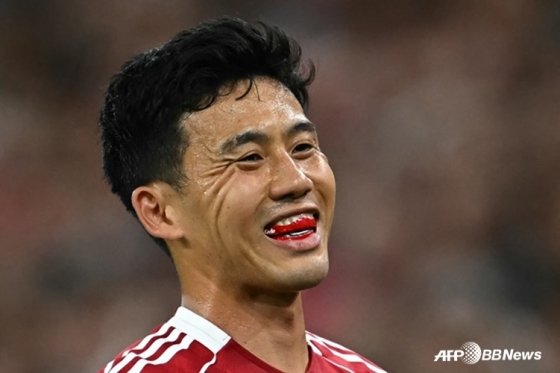 利物浦中场恩多•瓦塔鲁。 =法新社BBNews=新闻1。