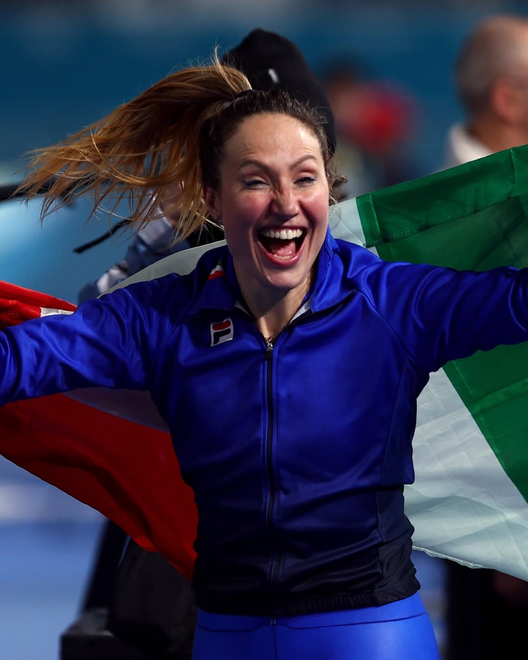 Francesca Rolodebridge is delighted after winning the gold medal in the women's 3,000m speed skating at the 2026 Milan-Cortina Winter Olympics at the Ice Skating Arena in Milan, Italy, with a time of 3:54.28. /Photo = TNT Sports SNS Capture