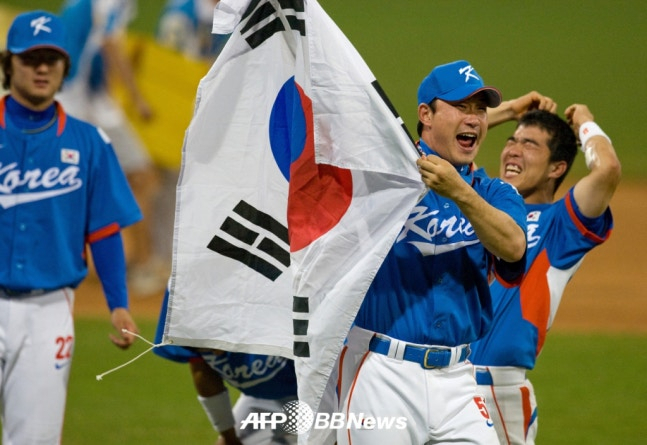 Các cầu thủ đội tuyển bóng chày quốc gia Hàn Quốc đã giành chiến thắng tại Thế vận hội Bắc Kinh 2008. /AFPBBNews = Tin tức 1
