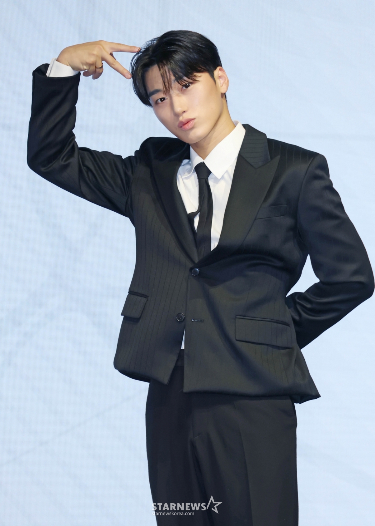 The group ATEEZ San poses before a press conference to commemorate the release of its 13th mini album "Golden Hour: Part 4" (GOLDEN HOUR: Part.4) at Fairmont Ambassador Hotel in Yeouido, Seoul, on the afternoon of the 5th. /2026.02.05 / Photo = Lee Dong-hoon photoguy@