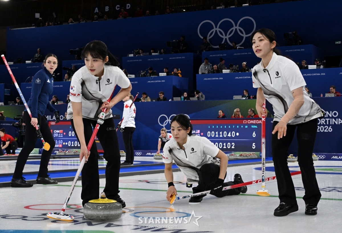 图为韩国女子冰壶代表队的比赛场景。 =路透社/news 1。