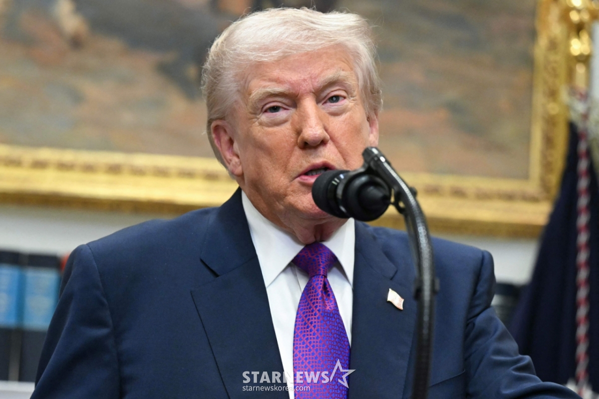 =当地时间12日,美国总统特朗普在华盛顿DC白宫罗斯福厅宣布废除温室气体的危害性决定。 2026.02.12. ⓒ AFP=新闻1 Copyright©新闻1. All rights reserved.禁止擅自转载及重新发布,禁止使用AI学习。 =照片=(法新社=新闻1)驻华盛顿记者柳正敏。