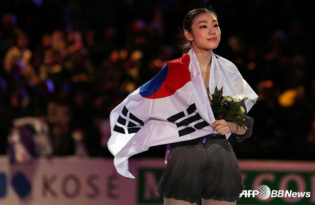 金妍儿在现役时期获得冠军，并戴着太极旗庆祝。 =法新社BBNews=新闻1。