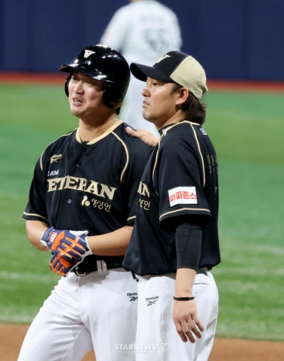 =高禹锡（左）和金相洙。