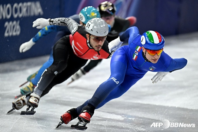 图为，彼得罗•西格尔（右）。 =法新社BBNews=新闻1。