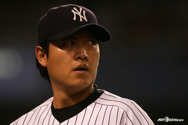 这是2007赛季效力于洋基队时取得19胜的王千明。 =法新社BBNews=新闻1。