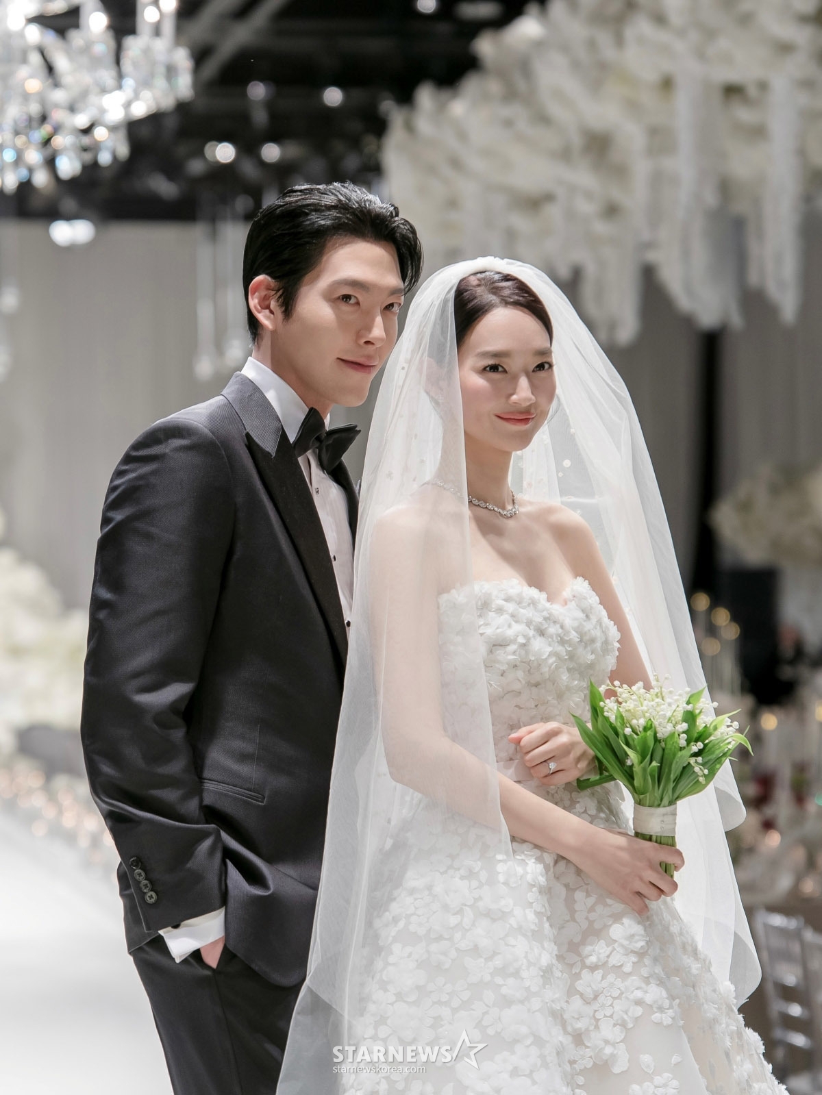 (Seoul = News1) = I.M. Entertainment released a photo of the wedding ceremony of actors Shin Min-ah and Kim Woo-bin at the Shilla Hotel Dinasty Hall in Jung-gu, Seoul on the 20th. (Courtesy of AM Entertainment). Resale and DB prohibited) 2025.12.22/News1 Copyright © News1. All rights reserved. Unauthorized reproduction and redistribution, and prohibition of using AI learning. /Photo = (Seoul = News 1)