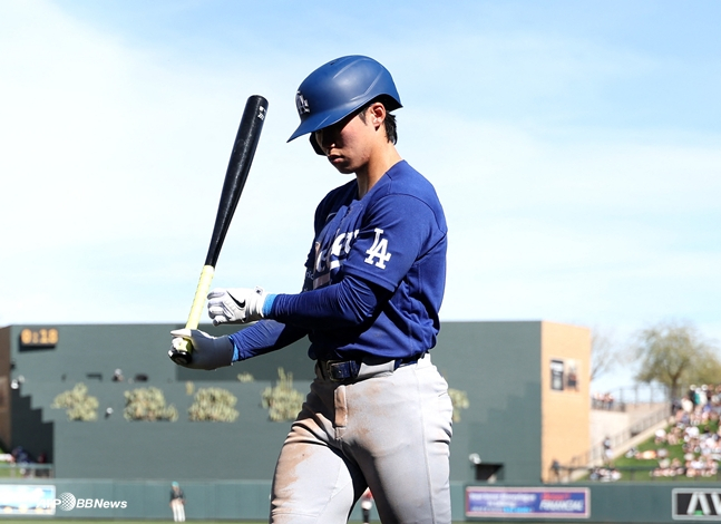 图为，26日与亚利桑那响尾蛇队的比赛中，金惠成正站在击球位上。 =法新社BBNews=新闻1。