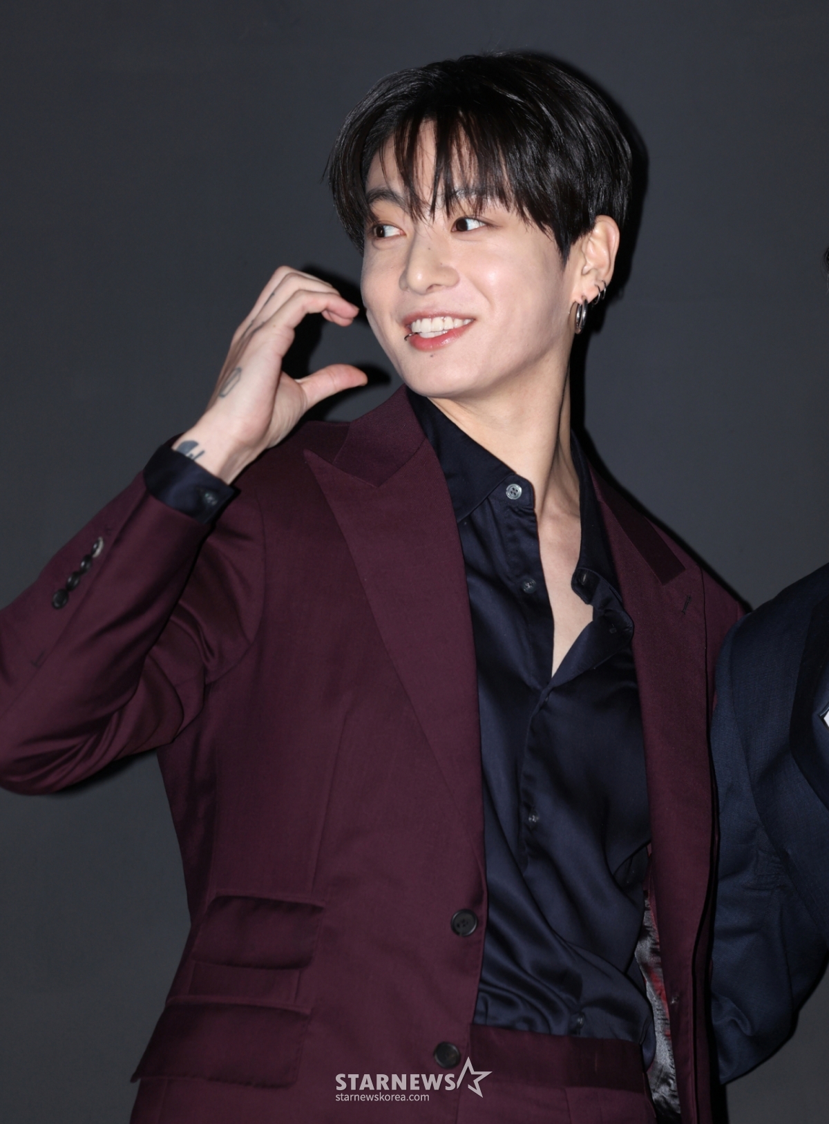(Seoul = News1) Reporter Kwon Hyun-jin = Jungkook of BTS (BTS) poses at a photo call event held at the Wiblo store in Gangnam-gu, Seoul on the afternoon of the 12th. (Joint coverage) 2026.2.12/News1 Copyright © News1. All rights reserved. Unauthorized reproduction and redistribution, prohibition of using AI learning. /Photo = (Seoul = News 1) Reporter Kwon Hyun-jin