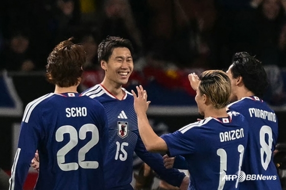 日本足球代表队选手们。 =法新社BBNews=新闻1。