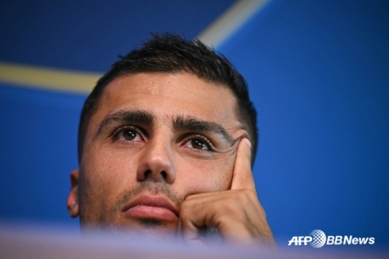 Думая, Родри. /AFPBBNews =Новости 1