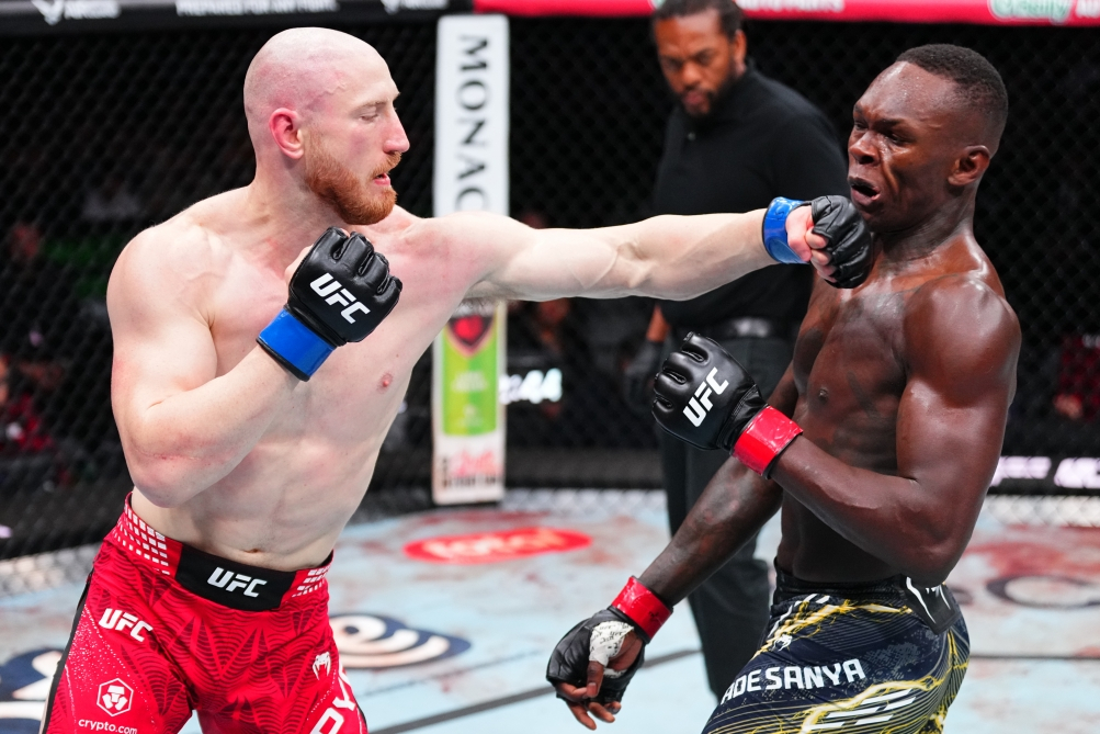 Joe Piper (left) and Israel Adesanya. /Photo = Courtesy of UFC