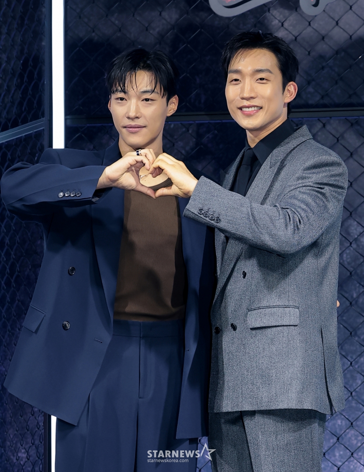 (Seoul = News1) Reporter Kwon Hyun-jin = Actors Woo Do-han and Lee Sang-i (right) pose at the production presentation for Season 2 (scripted by Kim Joo-hwan/directed by Kim Joo-hwan) at Ambassador Seoul Pullman Hotel in Jung-gu, Seoul on the morning of the 31st.  Season 2 of "Hunt Dogs" tells the story of Gunwoo (Woo Do-hwan) and Woo-jin (Lee Sang-eun), who beat up a gang of heinous illegal loan sharks, once again making a exhilarating hook against the global illegal boxing league dominated by money and violence. 2026.3.31/News1 Copyright © News1. All rights reserved. Unauthorized reproduction and redistribution, and prohibition of using AI learning. /Photo = (Seoul = News 1) Reporter Kwon Hyun-jin