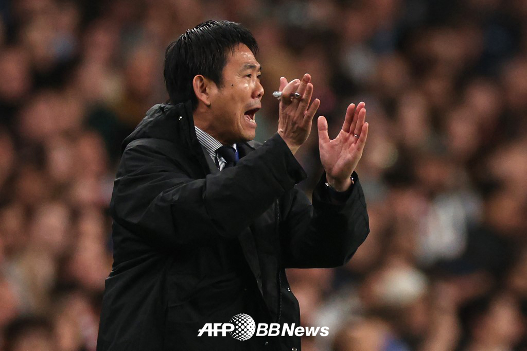 他就是日本足球代表队教练森保一。 =法新社BBNews=新闻1。