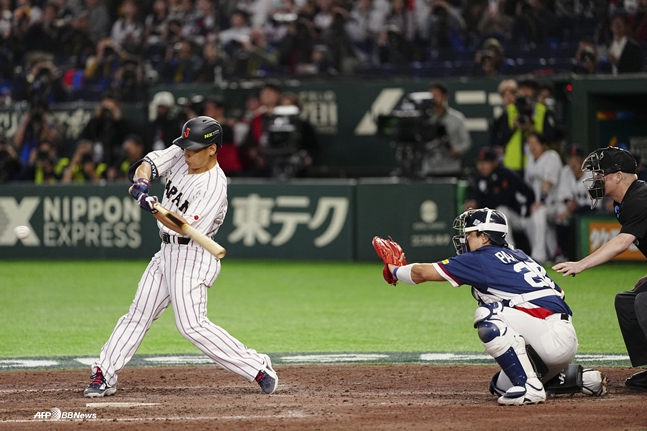 这是参加韩国战争并加以打击的吉田佳彦。 =法新社BBNews=新闻1。