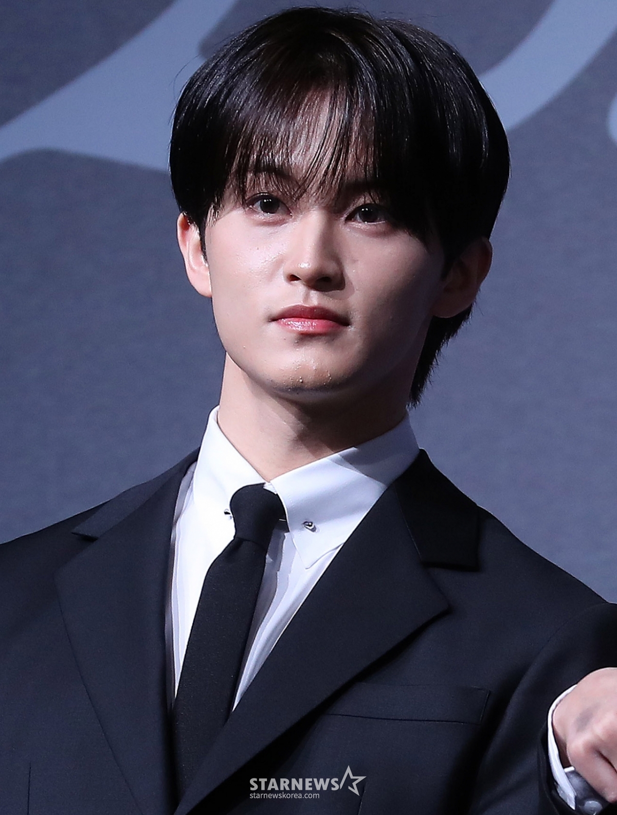 NCT DREAM组合Mark25日下午出席在首尔广津区华克山庄首尔举行的新专辑《DREAM SCAPE》发行纪念记者招待会,并摆出造型,供记者们拍照。 =图为,2024.03.25。