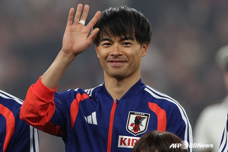 他就是日本国家足球队前锋水户薰。 =法新社BBNews=新闻1。