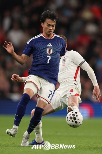 水户薰 =法新社BBNews=新闻1。