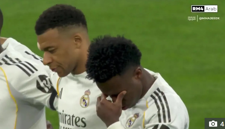 Kylian Mbappé observes a moment of silence. /Photo=The Sun archive