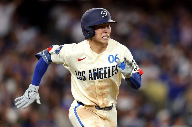 他就是洛杉矶道奇队的金惠成。 =法新社BBNews=新闻1。