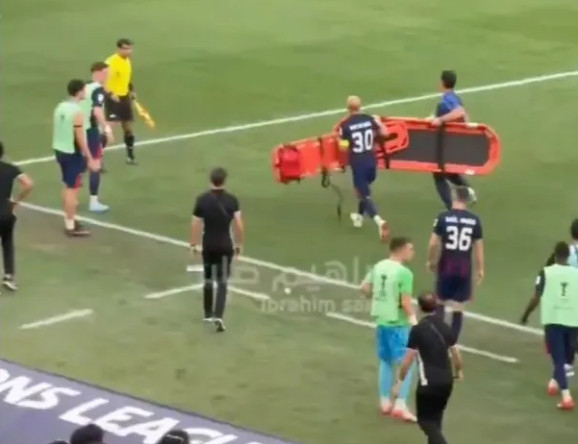 Johor's captain Nacho Insa (No. 30) is seen running while carrying a stretcher. /Photo=The Sun archive