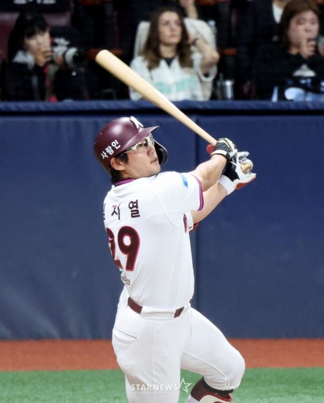 在第7局打出决胜球的林智烈。 =照片=高级记者姜英祖。