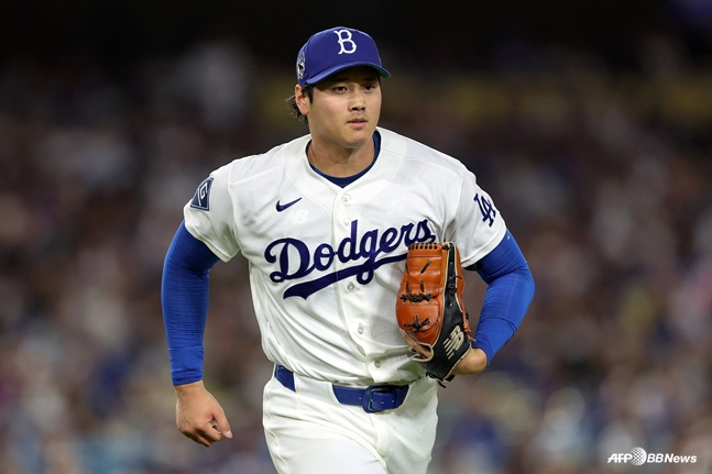 Hình ảnh Otani chạy như một cầu thủ ném bóng. /AFPBBNews = Tin tức 1