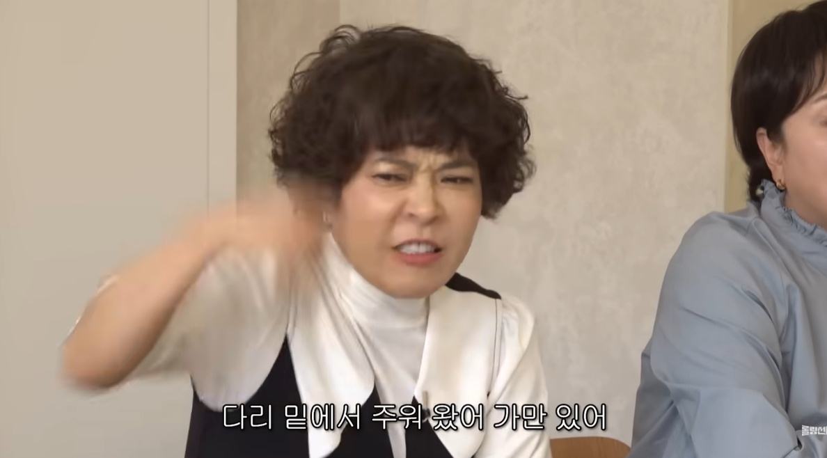 /Photo='New Woman' video screenshot