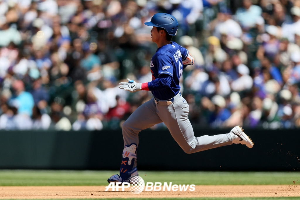 他就是洛杉矶道奇队的金惠成。 =法新社BBNews=新闻1。