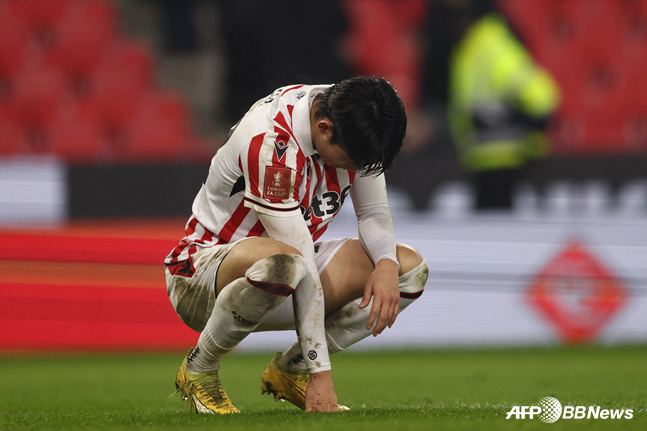 Ba Jun-ho expresses regret during a match.