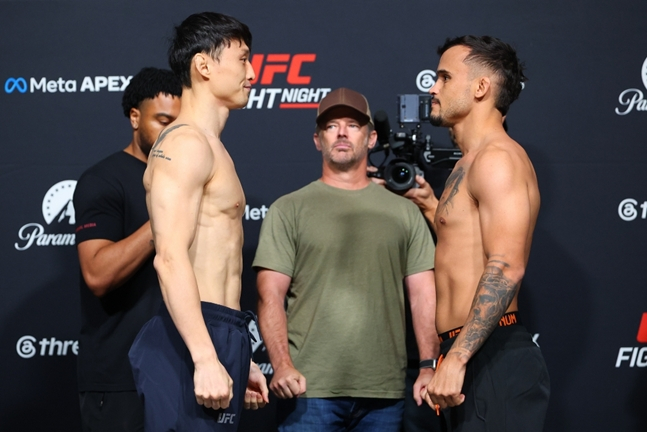 Лицом к лицу между Чхве Ду Хо и Санчесом. /Фото =UFC