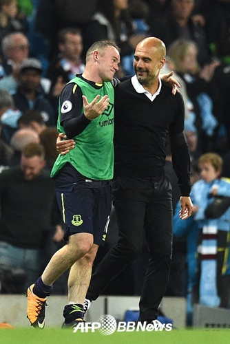 Wayne Rooney (left) and Pep Guardiola. /AFPBBNews=NEWS1