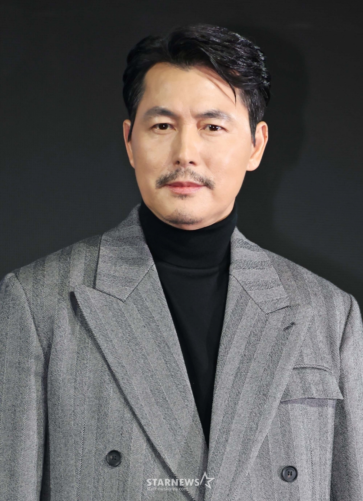 Actor Jung Woo-sung poses at the production announcement for the Disney+ original series 'Made in Korea,' held on the morning of the 15th at the Grand InterContinental Seoul Parnas Hotel in Gangnam-gu, Seoul. 'Made in Korea' is a story unfolding in the whirlwind of the times, featuring a man driven by ambition for wealth and power and a prosecutor who gives up everything to stop him. The series will be released on the 24th. /2025.12.15 /Photo=Photographer Lee Dong-hoon photoguy@
