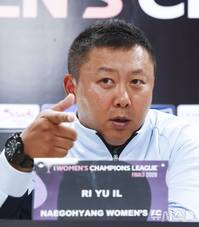 Lee Yu-il, head coach of North Korea's Naegohyang Women's Football Team, answers reporters' questions during an official press conference held one day before the 2025-26 Asian Football Confederation (AFC) Women's Champions League (AWCL) final at Suwon Sports Complex on the 22nd. /Photo=NEWSIS