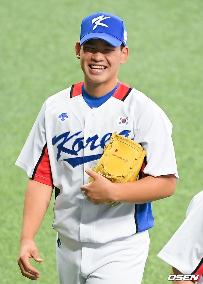 Kim Jin-wook en los Juegos Olímpicos de Tokio 2020. En aquel entonces, tenía 19 años y era el miembro más joven del equipo nacional.