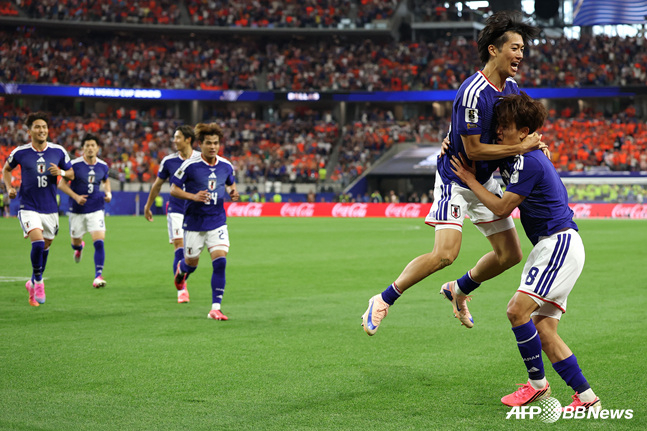 Japanese players celebrating. /AFPBBNews=NEWS1