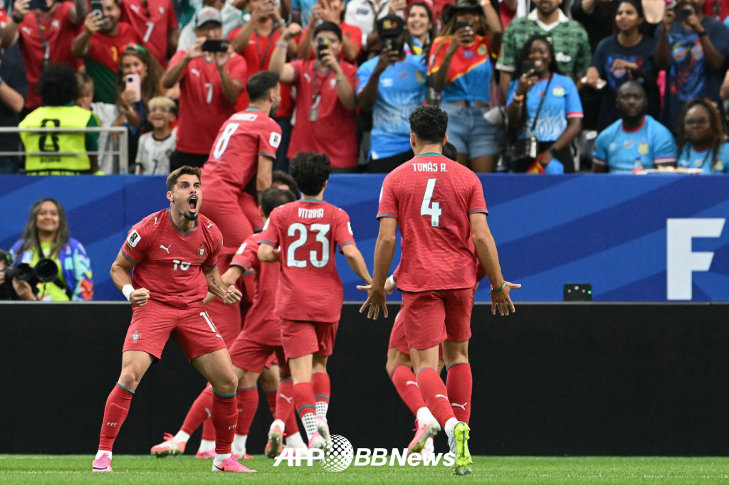 Portugal players celebrate after Joao Neves scored the opening goal in the 6th minute of the first half during the Group K opener of the 2026 FIFA North, Central America and Caribbean World Cup against DR Congo on the 18th. /AFPBBNews=NEWS1