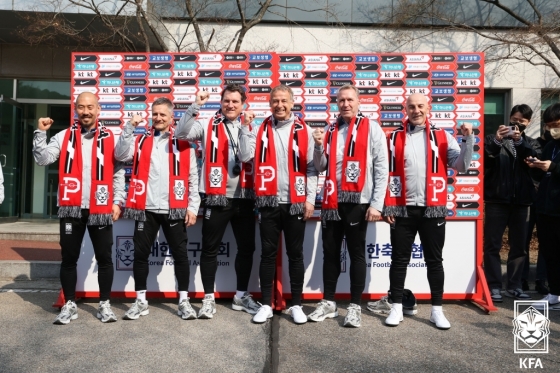 When Klinsmann (third from right) assumed the role of South Korean national team coach in February last year. To Klinsmann's left is Huh Jung-hoo. /Photo provided by Korea Football Association (KFA)