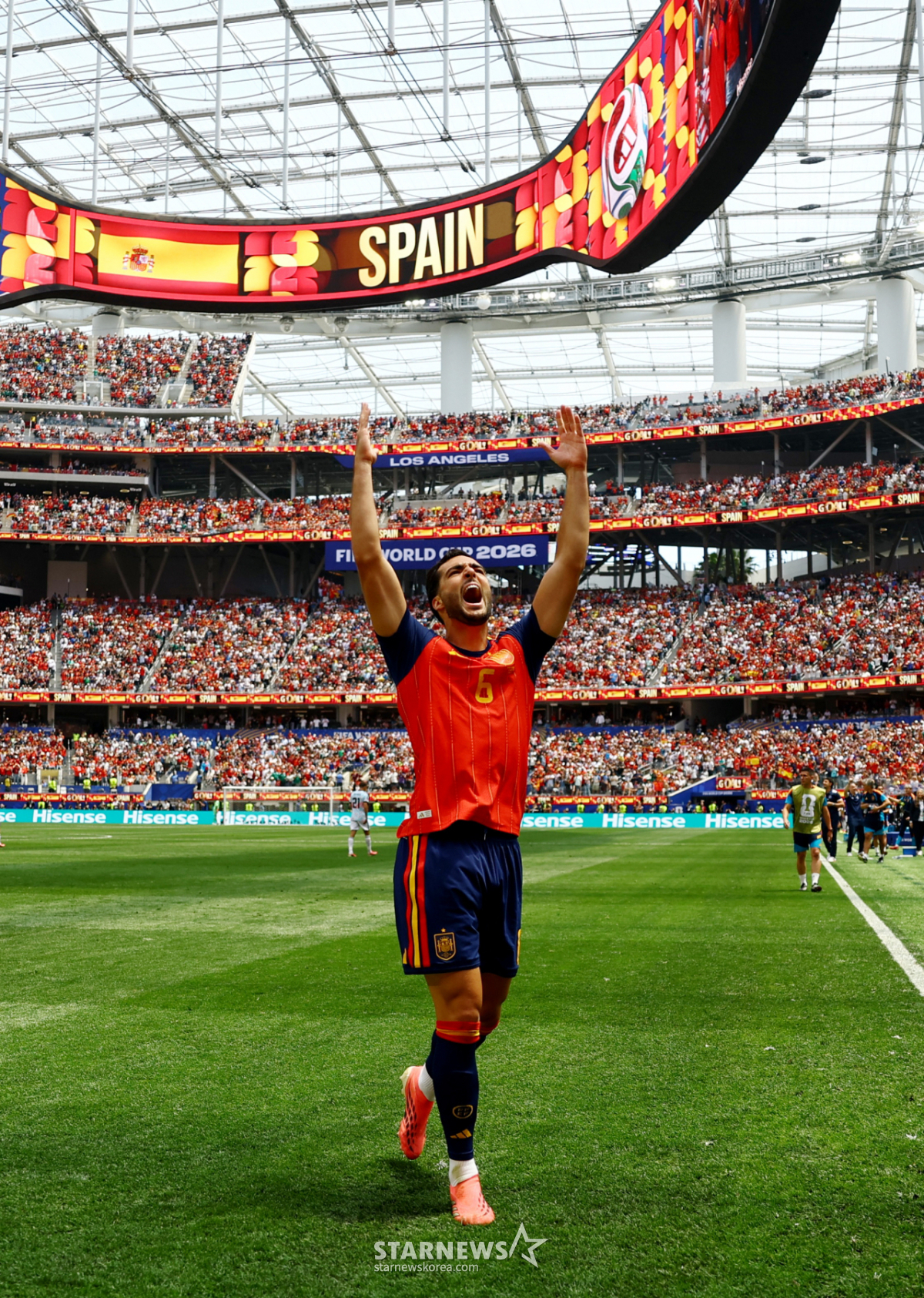 Spanish national team midfielder Mikel Merino celebrates after scoring during the 2026 FIFA North American World Cup Round of 16 match against Belgium at LA Stadium in Los Angeles on the 11th. /Photo=Reuters=NEWS1