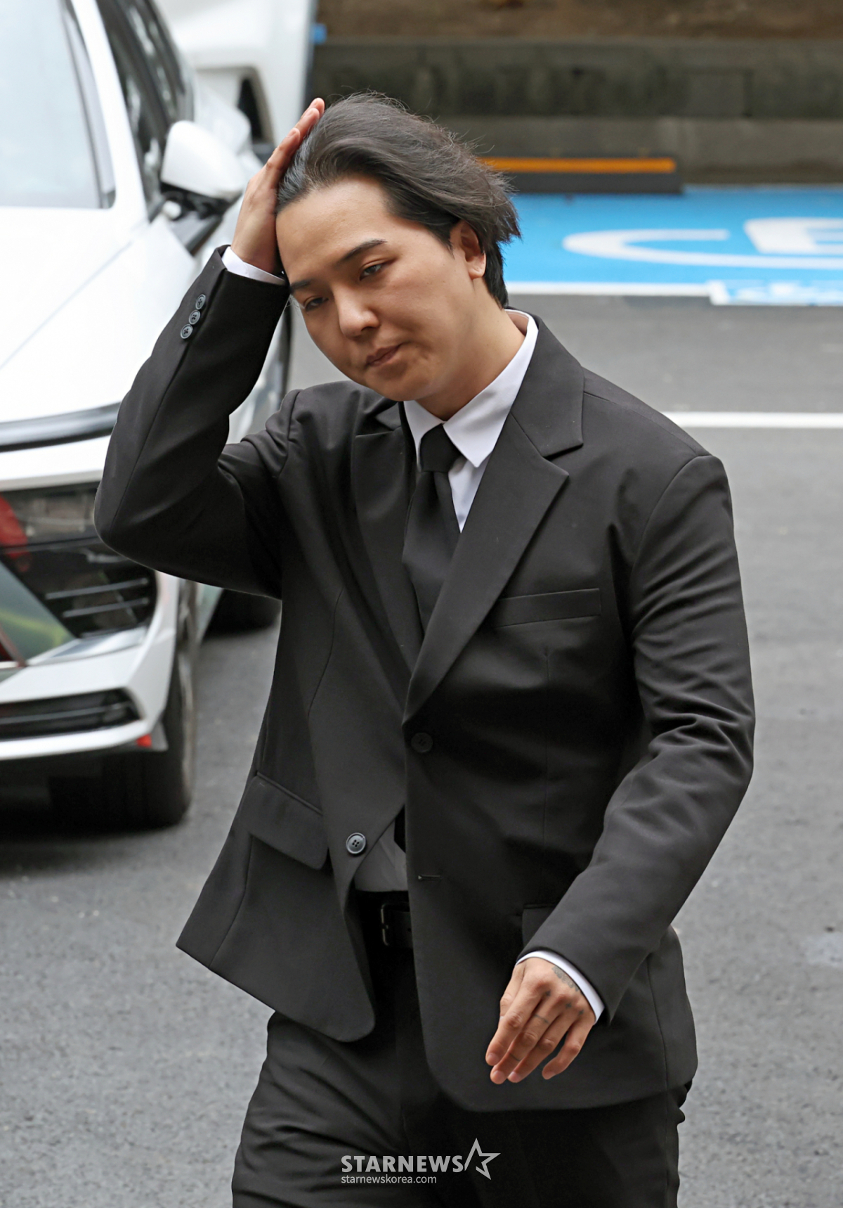 【首尔=Newsis】金锦宝记者=因违反兵役法在一审中被判处有期徒刑1年6个月的组合"Winner"宋旻浩14日下午在首尔麻浦区首尔西部地方法院举行的当时服务管理负责人A某的公审中作为证人出席。 =2026.07.14. kgb@newsis.com 。