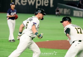 [相片儿] 澳大利亚格兰德宁队追上"5-0韩国领先"一分