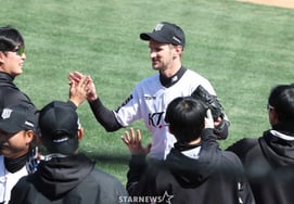 [相片儿] 博世利"对我的投球很满意"