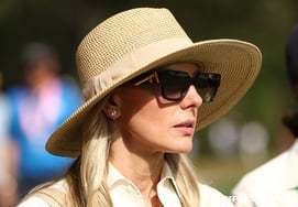 "I'm next to my wife and she's like, 'What are you doing?'" WOODZ's text message... McIlroy's wife is also maxed out, "Golf Emperor's Journey."