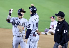 [フォト] 「6回表、4点差で放った2打点のタイムリーヒット」黄英木