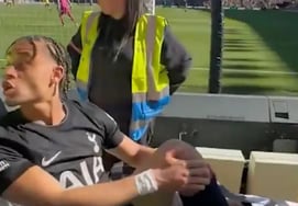 'Disaster' Tottenham's No. 7 carried off on a stretcher amid profanity-laced brawl with fans... "Even my shattered knee feels unjust" as relegation battle turns red