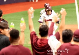 [Foto] ¡Terminó con un grand slam! An Chi-hong