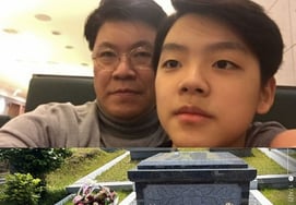 "I love you, Dad." Noel visits the grave of his late father, Jang Je-won
