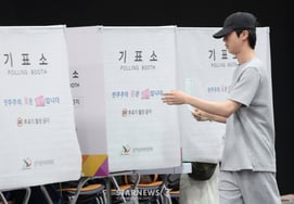 BTS Jin casts a precious vote amidst a busy schedule; voting attire draws attention